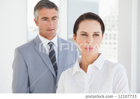 Concentrated businesswoman looking away 12107733