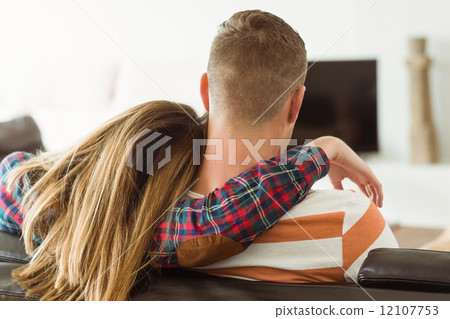 Cute couple relaxing on couch 12107753