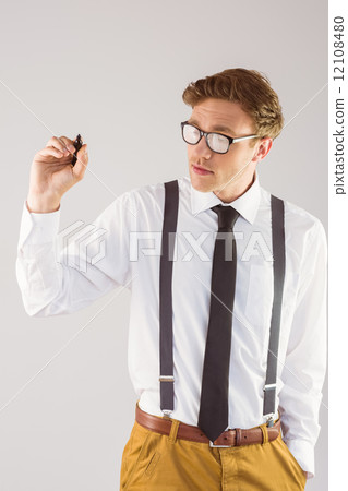 Geeky businessman writing with marker 12108480