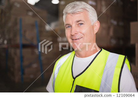 Close up of worker in warehouse Close up of worker in warehouse 12109064