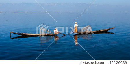 Traditional Burmese fishermen at Inle lake Traditional Burmese fishermen at Inle lake 12126089