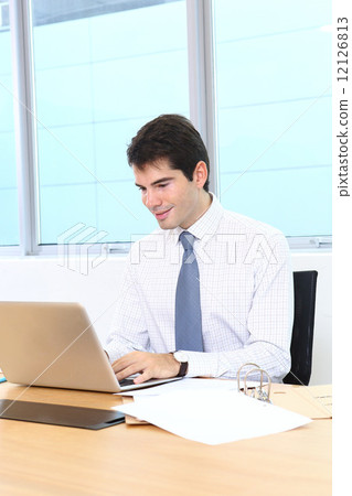 Foreign businessman at work 12126813