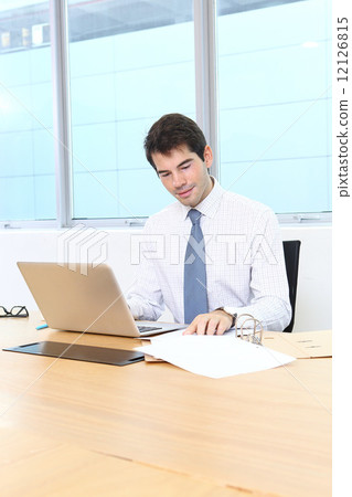Foreign businessman at work 12126815