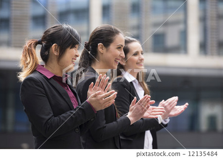 3 Business women clapping 3 Business women clapping 12135484