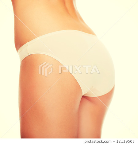 woman in cotton underwear showing slimming concept woman in cotton underwear showing slimming concept 12139505