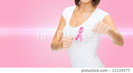 woman with pink cancer awareness ribbon 12139577