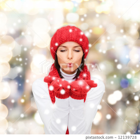 smiling young woman in winter clothes 12139728