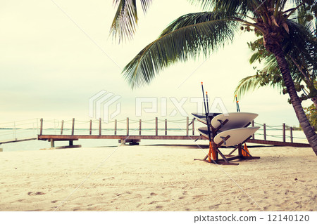 surfboards on tropical beach surfboards on tropical beach 12140120