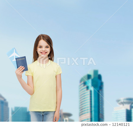 smiling little girl with ticket and passport smiling little girl with ticket and passport 12140121