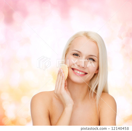 beautiful woman with sponge 12140458