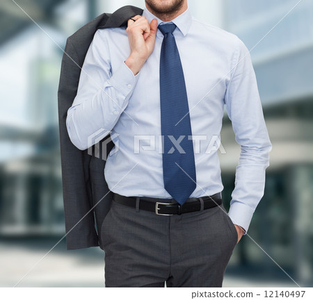 close up of businessman standing outdoors close up of businessman standing outdoors 12140497