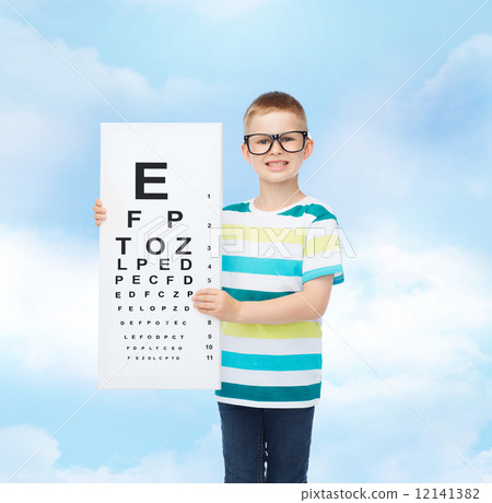 smiling boy in eyeglasses with white blank board 12141382