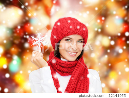 smiling young woman in winter clothes 12141955