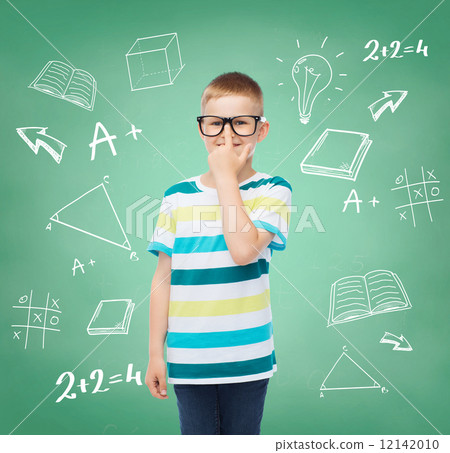 smiling little boy in eyeglasses 12142010