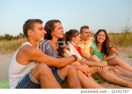 smiling friends in sunglasses on summer beach 12142787
