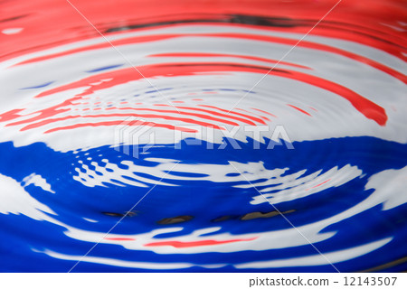 Water droplet against a Dutch flag 12143507