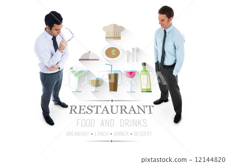 Unsmiling businessman holding glasses 12144820
