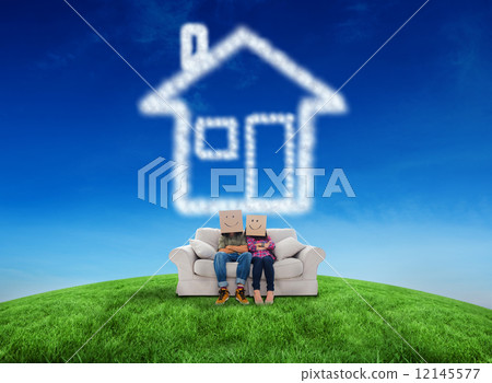 Composite image of silly employees wearing boxes on their heads 12145577