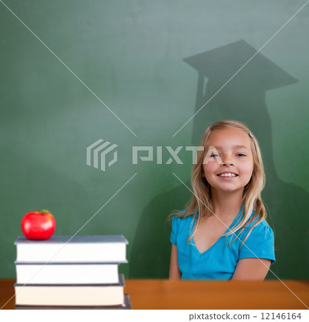 Composite image of cute pupil with graduate shadow Composite image of cute pupil with graduate shadow 12146164