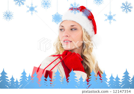 Composite image of festive blonde holding shopping bags Composite image of festive blonde holding shopping bags 12147354