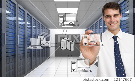 Composite image of smiling businessman holding marker 12147667