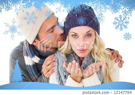 Composite image of attractive couple in winter fashion 12147764