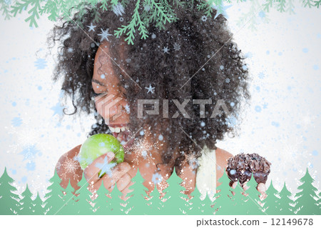 Young woman going to eat a delicious green apple Young woman going to eat a delicious green apple 12149678