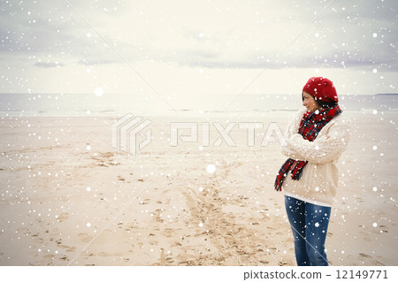 Pretty woman in stylish warm clothing at beach Pretty woman in stylish warm clothing at beach 12149771