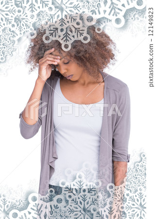 Sad woman holding her forehead 12149823