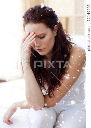 Beautiful woman having a headache in bed Beautiful woman having a headache in bed 12149993
