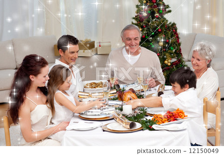 Composite image of brother and sister pulling a christmas cracke 12150049