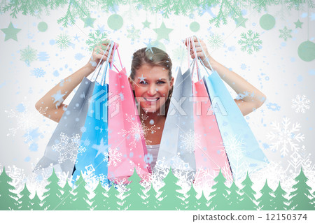 Joyful woman holding shopping bags Joyful woman holding shopping bags 12150374