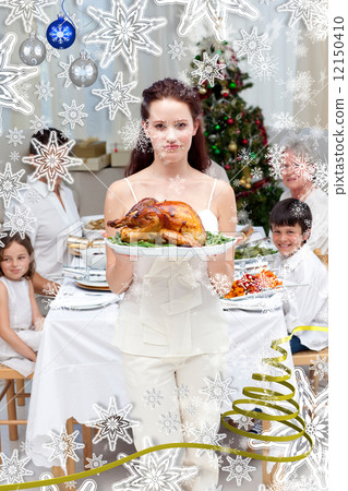 Mother showing turkey for christmas dinner 12150410
