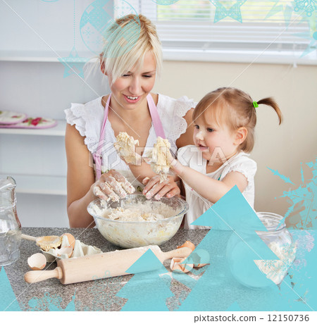 Simper woman baking cookies with her daughter 12150736