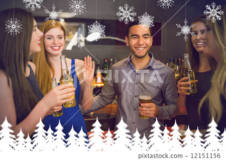 Composite image of happy friends holding beers 12151156