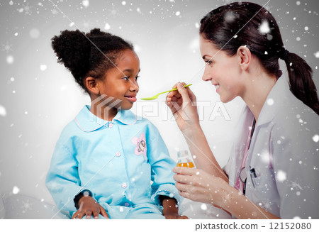 Composite image of adorable little girl taking medicine 12152080