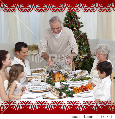 Family celebrating christmas dinner with turkey at home Family celebrating christmas dinner with turkey at home 12152621
