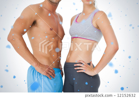 Mid section of a fit young couple 12152632