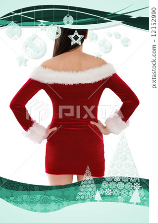 Composite image of santa girl standing with hands on hips 12152990