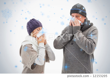 Sick mature couple blowing their noses 12153205