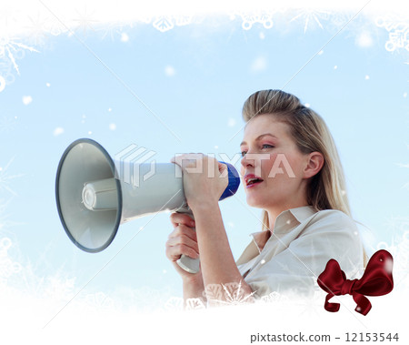Blonde businesswoman shouting through megaphone 12153544