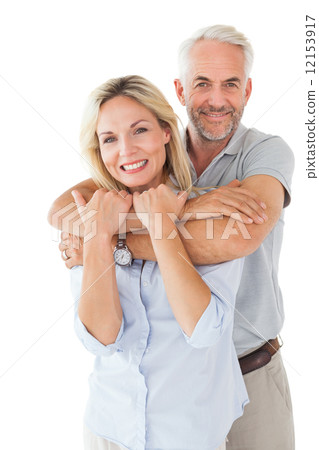 Happy couple standing and hugging Happy couple standing and hugging 12153917