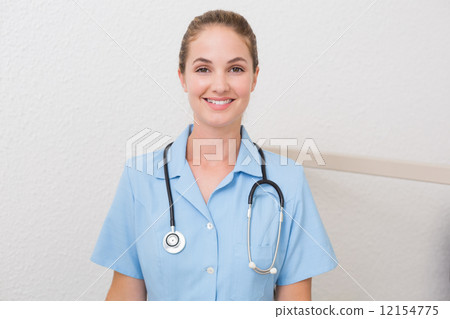 Dental assistant smiling at camera 12154775