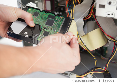 Computer engineer working on broken cpu Computer engineer working on broken cpu 12154994