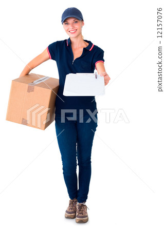 Happy delivery woman holding cardboard box and clipboard Happy delivery woman holding cardboard box and clipboard 12157076