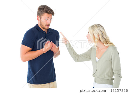 Woman accusing her guilty looking boyfriend 12157226