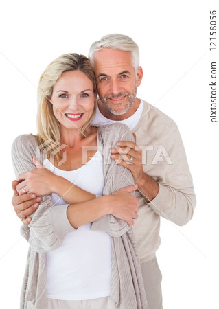 Happy couple standing and hugging 12158056