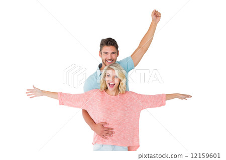 Attractive couple smiling and cheering 12159601