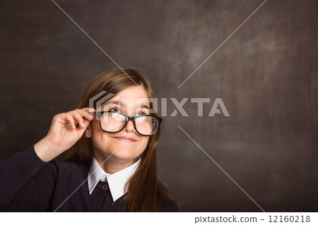 Cute pupil smiling and looking up Cute pupil smiling and looking up 12160218