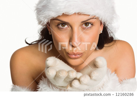 Woman blowing kiss to camera 12160286